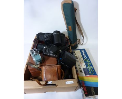Collection of vintage/retro cameras and accessories including Voigtlander Bessa 66, Polaroid Sun660 Autofocus SE, Nikon EM,  