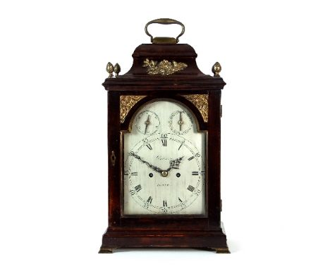 An 18th Century eight-day bracket clock by Barwise, London, the pierced case with bell top set a handle and with pineapple co