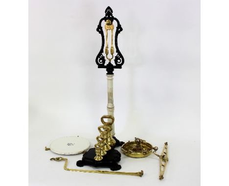 A set of brass scales, W & T Avery, Birmingham, on a ceramic column to a cast iron base with paw feet, 85cm high
