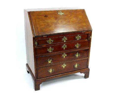 A George III mahogany bureau fitted four drawers on bracket feet, 76cm wide