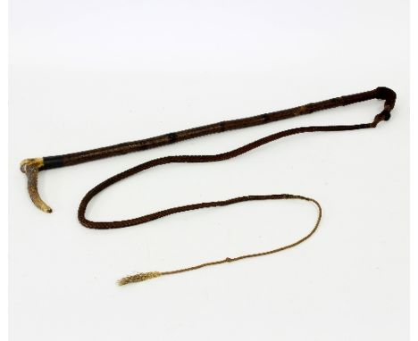 A horn handled hunting crop