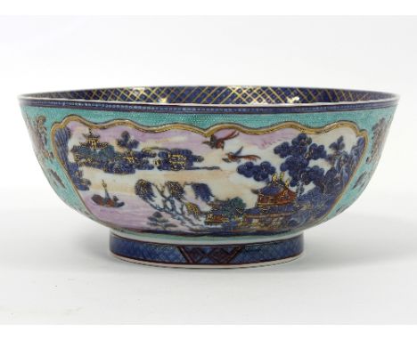 A Chinese export punch bowl, decorated landscapes in reserves to a turquoise ground, 28cm diameter   Condition Report:  Lot 2