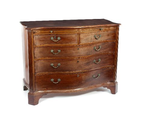 A Regency serpentine front chest, the brushing slide above two short and three long drawers, on bracket feet, 117cm wide/see 