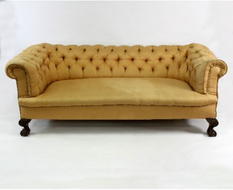 A Chesterfield button back upholstered sofa with carved ball and claw front legs, 215cm wide   Condition Report:  Lot 512Left