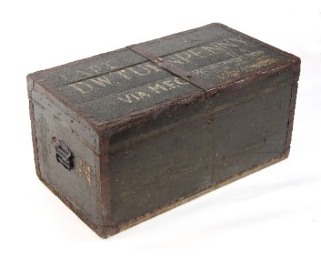 A black painted wooden trunk with metal mounts, 'Captain D W Turnpenny' painted to top, 86cm wide