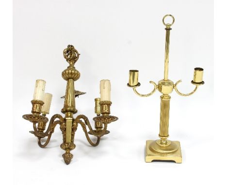 A gilt metal four-branch chandelier and a two-branch table lamp