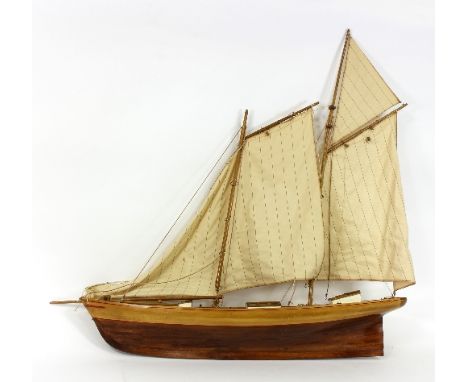 A model gaff rig schooner complete with sails, 90cm long