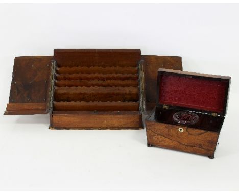 A Regency rosewood tea caddy of sarcophagus shape, 28cm wide and an Edwardian walnut stationery box, 38cm wide