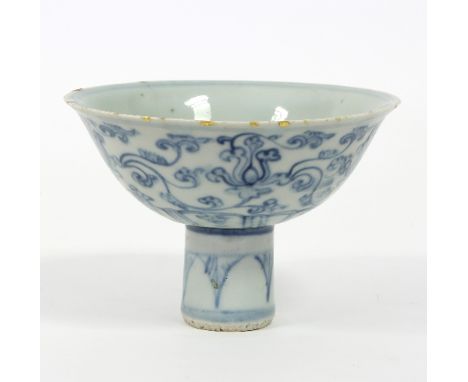 A Chinese blue and white stem cup, 17th/18th Century, decorated with scrolling flowers, 14cm high   Condition Report:  Lot 15
