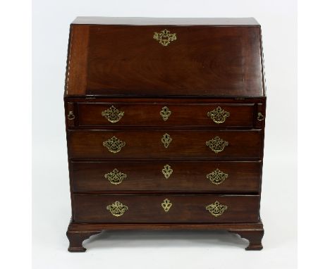 A George III mahogany bureau with fitted interior above four graduated drawers on ogee bracket feet, 89cm wide