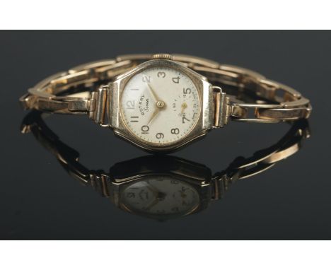A ladies 9ct Gold Rotary Seven manual wind wristwatch, on 9ct Gold Britannic watch strap. Total weight: 16.4g  Not in running