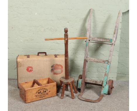 A collection of assorted items including Airport case bearing Cunard Line stickers, vintage sack barrow and wooden dolly peg.