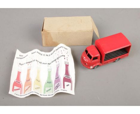 A Mettoy (pre-Corgi) diecast 1:43 scale promotional model Commer Milk deliver van, in red 'CWS Soft Drinks Thirst Come, Thirs