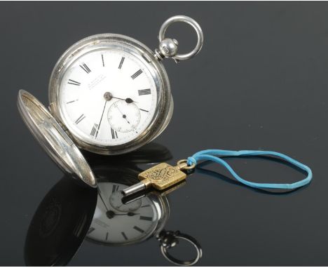 A silver cased full hunter pocket watch, having engine turned case, enamel dial with subsidiary seconds dial by H Samuel Mark