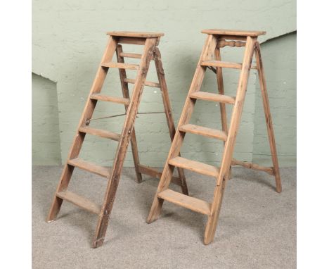 Two pairs of vintage five-rung wooden stepladders. To include Simplex example.  