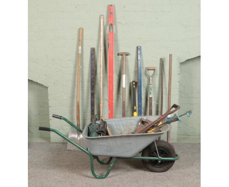 A large quantity of gardening and DIY tools including electric belt sander, Stanley plane, shovels, axes, g clamps, sash clam