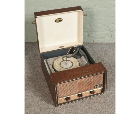 A 1950's original oak cased Dansette record player  