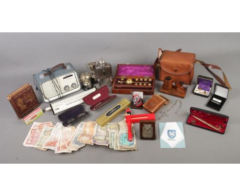 A tray containing a large assortment of collectable items, to include boxed Sikes hydrometer, hip flask, banknotes, cased box