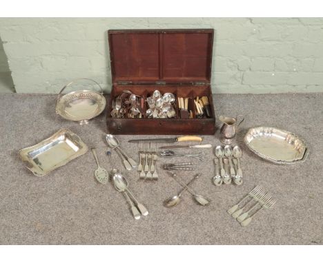A hinged wooden chest containing a good collection of silver plated metalwares, including a large quantity of Walker and Hall