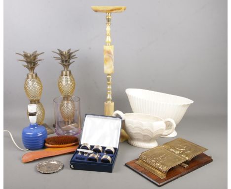 A pair of glass pineapple candlesticks together with onyx effect stand, Dartmouth Devon ware, napkin ring set (incomplete), l