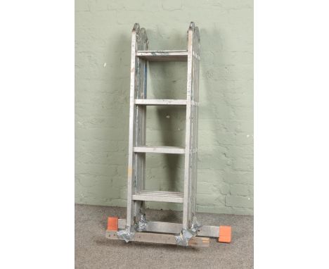 A large Krause universal aluminium folding ladder  