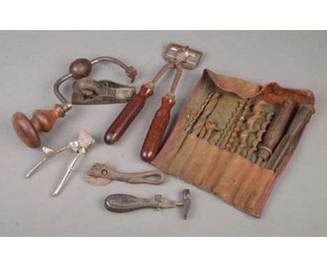 A quantity of tools. Includes W Bown Newmarket Clipper, cow can opener, small wood plane etc.  
