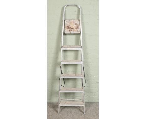 A set of aluminium step ladders  