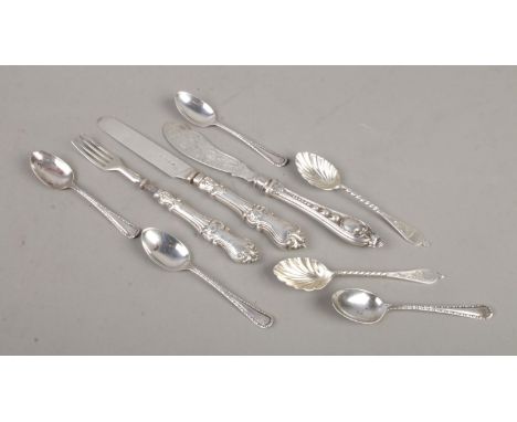 A quantity of assorted silver flatware, to include six various teaspoons, and matching silver bladed knife and fork. Weighabl