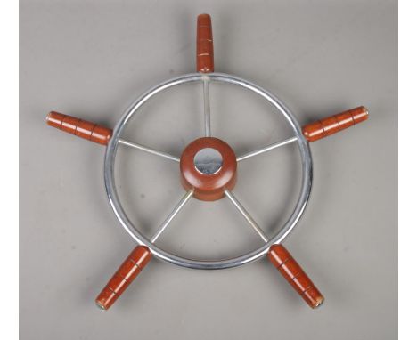 A vintage five-spoke ships wheel. 57cm diameter.  