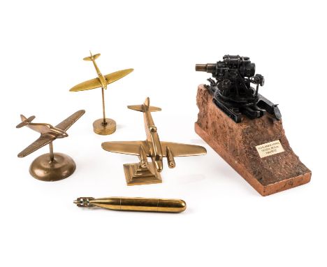 *Aircraft Recognition Models. A WWII period brass spitfire,  mounted on a stand, 15cm wingspan, bomber mounted on a stand, 22