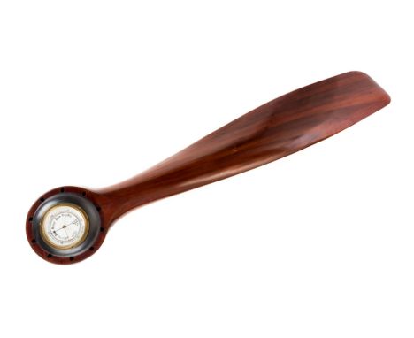 *Propeller. A WWI laminated mahogany propeller blade,  the large boss with aneroid barometer by Riess, 150 cm long  (1)
