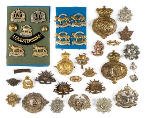 *Military Badges. A collection of WWI and later military badges,  including a Victorian Grenadier Guards brass martingale bad