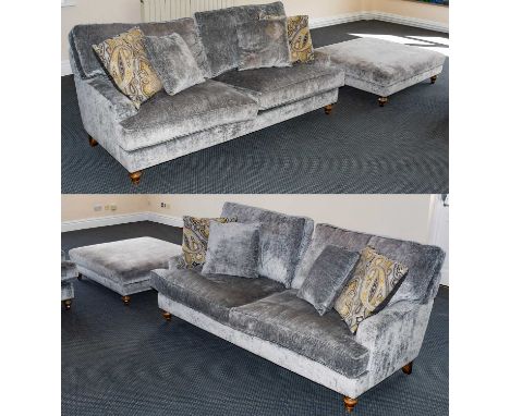 A modern light grey upholstered five-piece suite raised on turned supports, comprising a pair of three-seater sofas, 210cm wi