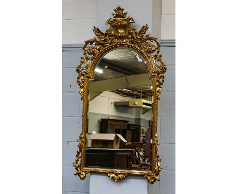 A Louis XIV style marble top console table of recent date, raised on reeded legs joined by a stretcher, and a gilt compositio