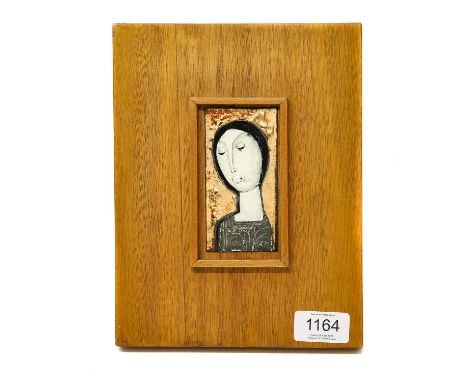 Margit Kovács (1902-1977) HugarianPortrait of a ladyEnamel on a wooden plaque, 22cm by 17cm (overall size)