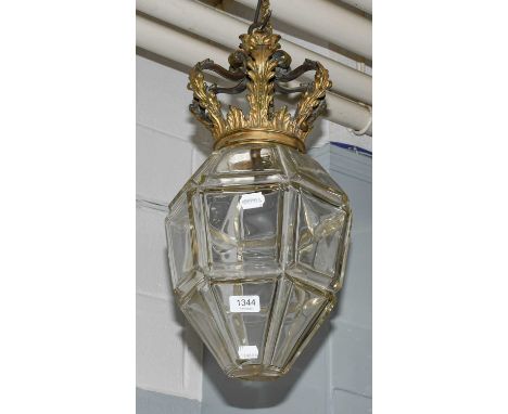 A cut glass faceted ceiling light with coronet form brass fittings, 45cm drop