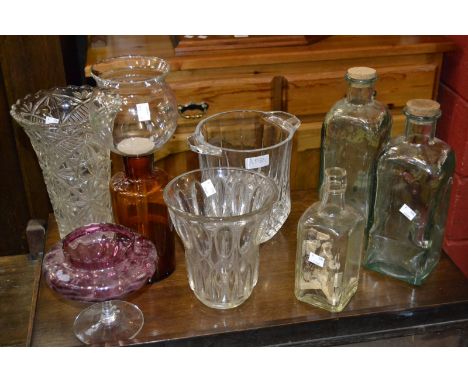 Glassware - An apothecary jar; two unusual oil jars with brass taps; a wine ice bucket; a cranberry glass vase; an unusual ei