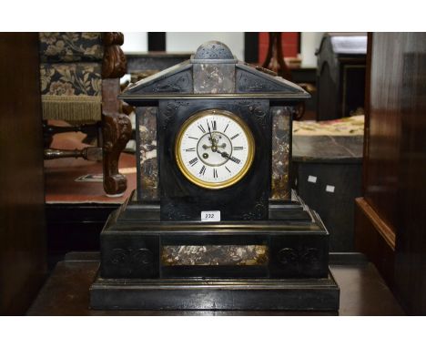 A Victorian belge noir mantel clock, of large proportions, red marble detailing, enamel face, Roman numerals,  c.1870