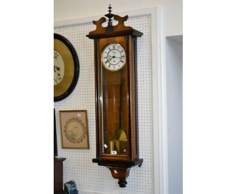 A 19th century single weight Vienna wall clock, enamel dial