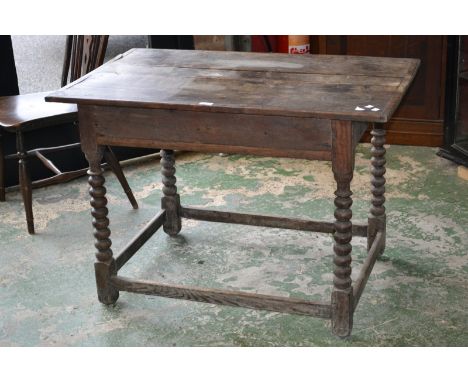 A George III oak lowboy bobbin turned supports C1800.
