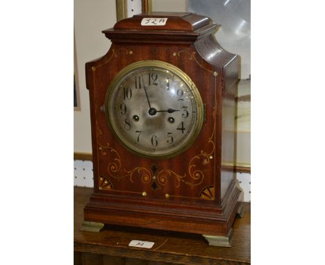 An Edwardian mahogany and marquetry bracket clock, inlaid with mother of pearl, boxwood and ebony, brass bracket feet, c.1905
