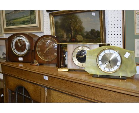 A Bentima oak mantel clock, c.1930; two Smiths mantel clocks; a Metamec mantel clock