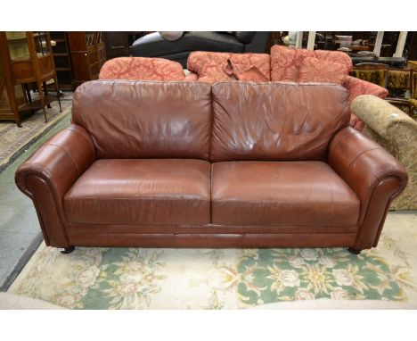 A modern leather three seater sofa