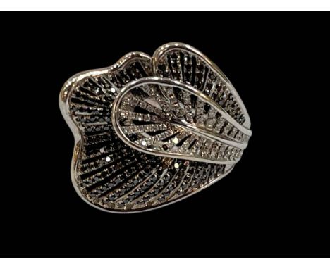 Black and white diamond 18 carat white gold fancy design ring, diamond 1.03 carats, size O.