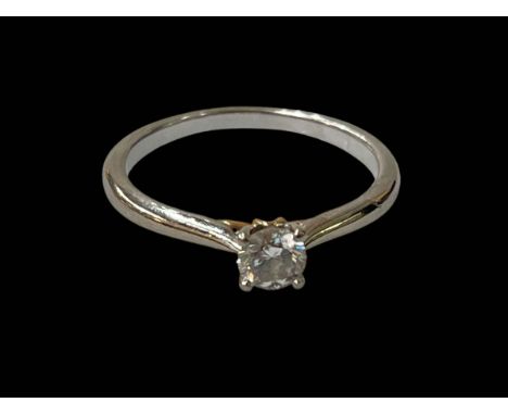 Solitaire diamond 18 carat white gold ring, size M.