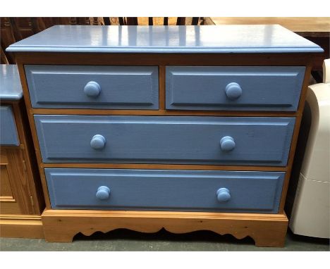 A pine chest of two short drawers over one long, the drawers and top painted a light blue