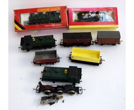 A Hornby 00 gauge GWR engine, boxed, and another Hornby GWR engine, along with another GWR engine (possibly Hornby) and rolli