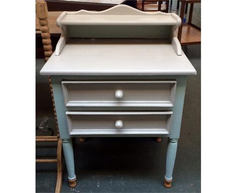 A pine bedside table with one drawer above cupboard, and a small painted side table with two drawers and shelf above