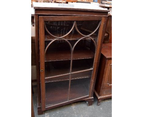 A small glass fronted bookcase with three shelves, raised on bracket feet, 107cmH, and a coal box on spade feet, 64.5cmH