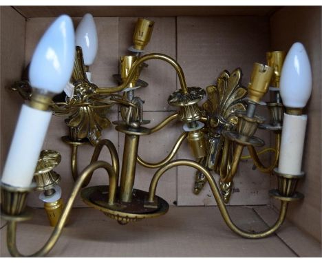 A gilt metal three arm ceiling light together with three matching gilt metal sconces